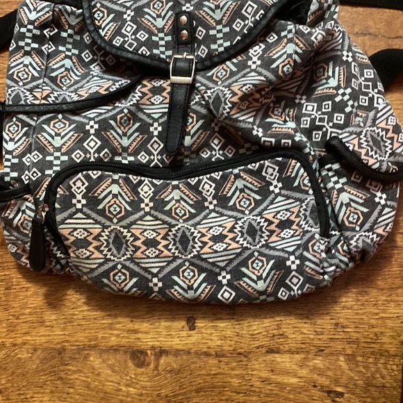 No Boundaries Printed Canvas Buckle Flap Backpack - Picture 3 of 11